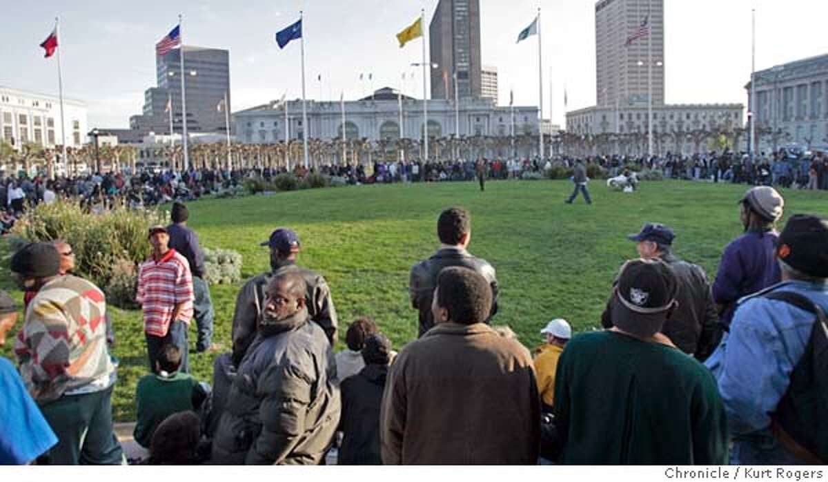Hundreds of people mostly homeless were lining a grass area in the Civic Center.wating for free money. A North Bay artist, Joe Canada, a former stock broker, plans on being at Civic Center Plaza at 4 p.m. today to give away his cash. He�s been doing this for two days already and says he's parted with $20,000 � and doesn't plan to stop �until it's all gone Kurt Rogers San Francisco SFC The Chronicle GIVEAWAY25_00013_kr.JPG MANDATORY CREDIT FOR PHOTOG AND SF CHRONICLE/ -MAGS OUT