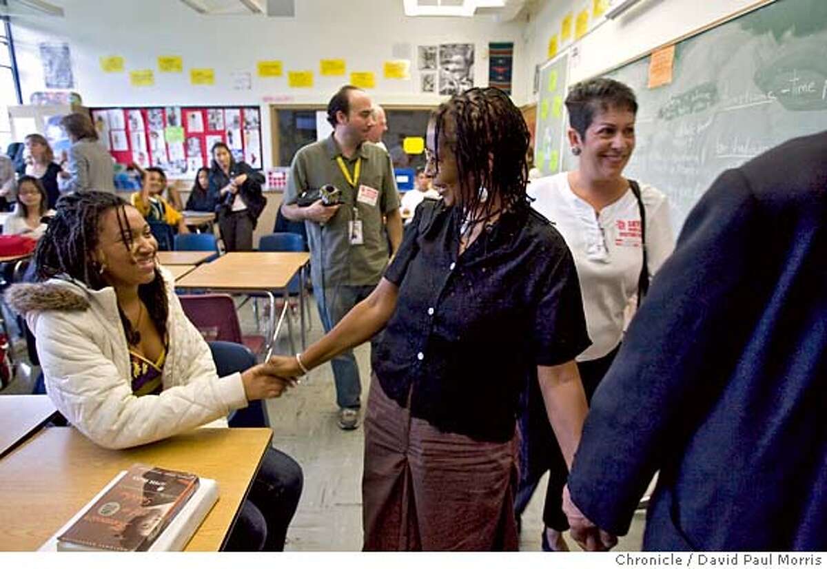 OAKLAND, CA - SEPTEMBER 14: Ayannah Jones, 15 shakes hands with author Alice Walker after she spoke to students about an essay challenge called " How I Changed My Own Life" at the Skyline High School September 14, 2007 in Oakland, California. (Photo by David Paul Morris/The Chronicle)