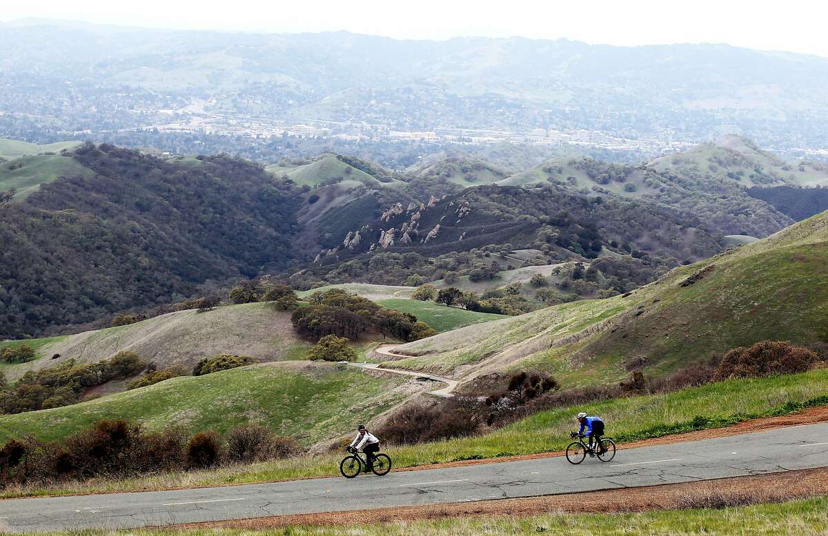 Cyclists make their way down from the from Mt Diablo State Park summit Saturday, March 17, 2012, in Walnut Creek, Calif.