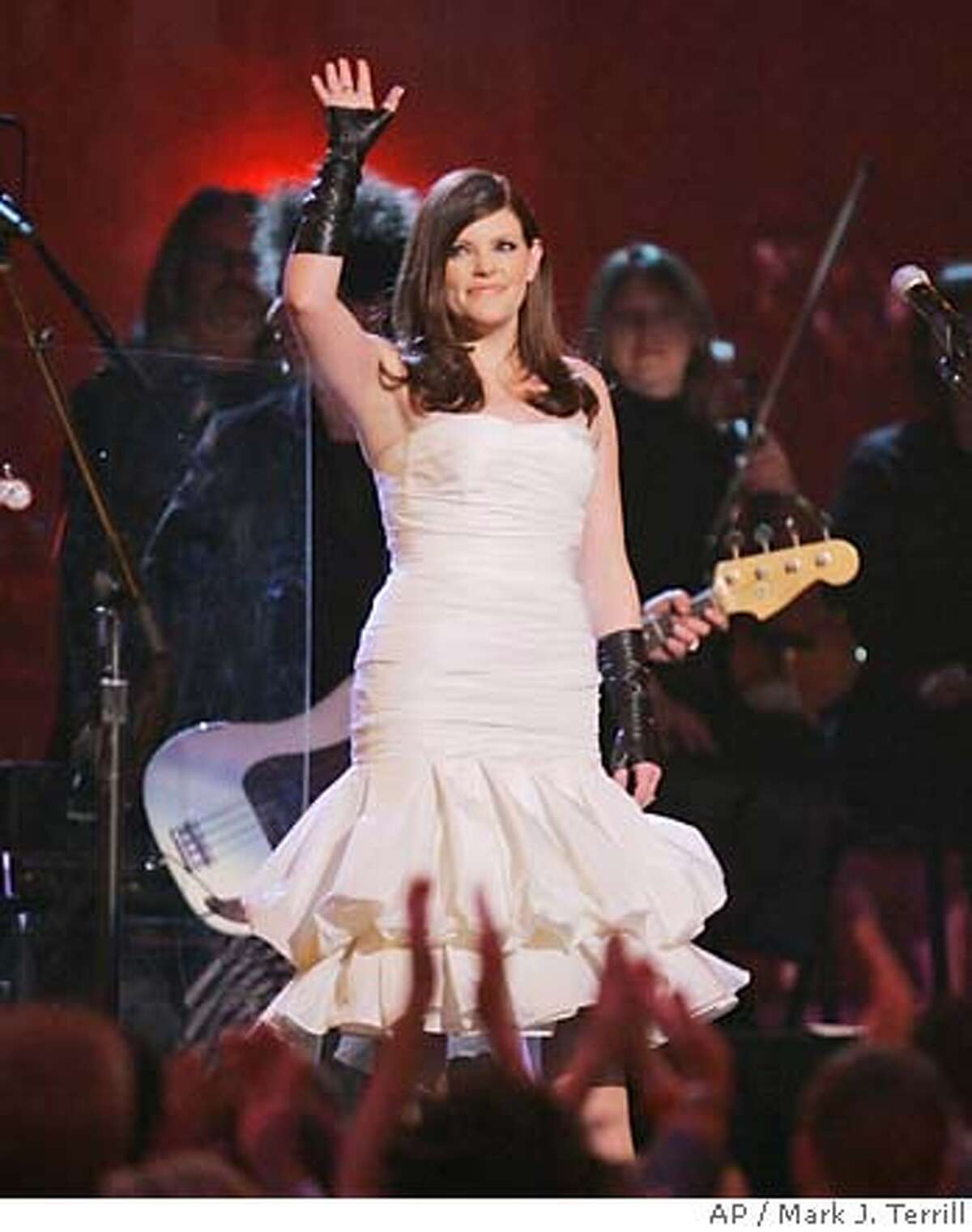Natalie Maines and The Dixie Chicks perform the song "Not Ready to Make Nice" at the 49th Annual Grammy Awards on Sunday, Feb. 11, 2007, in Los Angeles. (AP Photo/Mark J. Terrill) Ran on: 02-16-2007 Dixie Chicks (from left) Emily Robison, Natalie Maines and Martie Maguire bask in the glow of their Grammy victories, which came despite being shut out by country radio after Maines 2003 remark about President Bush and the then-pending invasion of Iraq.