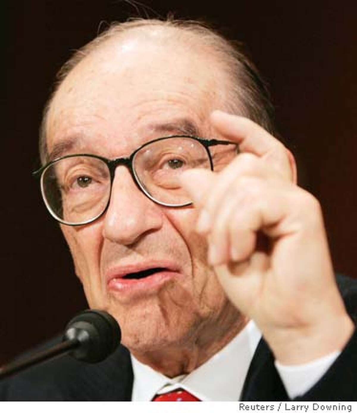 Chairman of the U.S. Federal Reserve Alan Greenspan testifies during his final scheduled testimony before the Senate Banking Committee on Capitol Hill, July 21, 2005. China's decision to let its currency rise in value is "a good start" toward better aligning the Asian trade giant's economy with the rest of the world, Greenspan said on Thursday during a session before the Senate Banking Committee. REUTERS/Larry Downing Ran on: 07-29-2005 Alan Greenspan made less than $80,700 on investments in 04. 0
