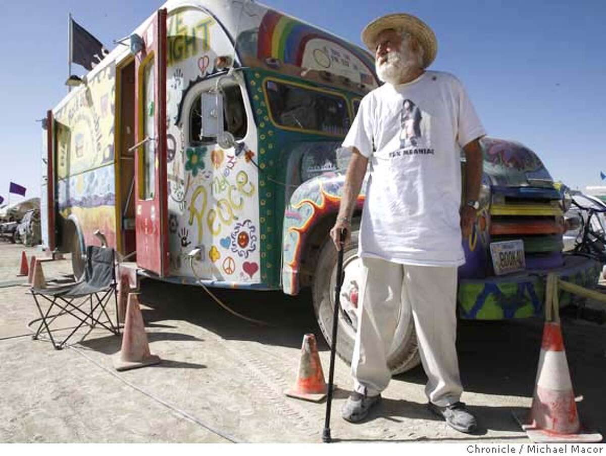 burningman_020_mac.jpg 82 year old Les Cole traveled to Burning for the firts time with his daughter Judi, who runs a book Mobile and Library. Burning Man 2007. Photographed in, Black Rock City, Nv, on 9/1/07. Photo by: Michael Macor/ The Chronicle Mandatory credit for Photographer and San Francisco Chronicle No sales/ Magazines Out