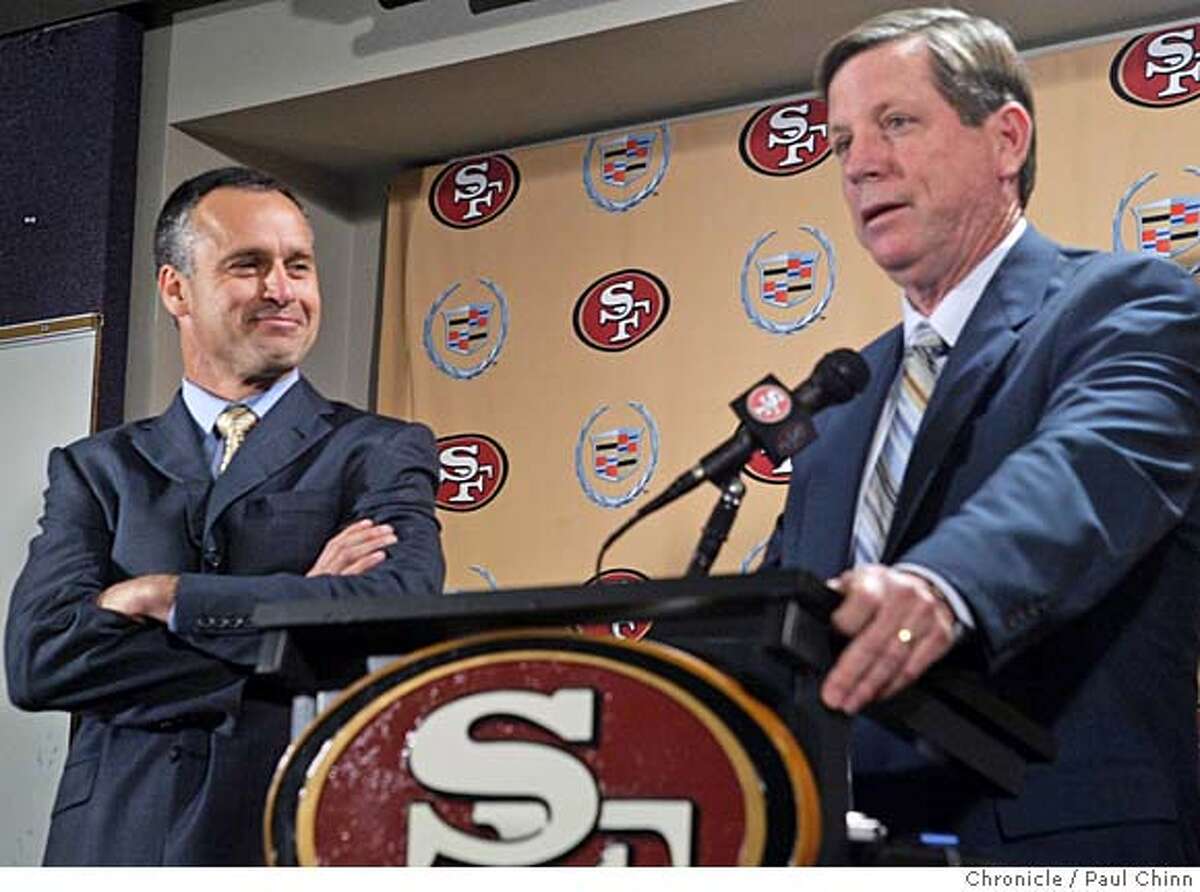 49ers18_030_pc.jpg Head coach Mike Nolan (left) smiles after the San Francisco 49ers named Norv Turner (right) as offensive coordinator at the team's headquarters in Santa Clara, Calif. on 1/17/06. Turner was recently fired as head coach of the Oakland Raiders. PAUL CHINN/The Chronicle MANDATORY CREDIT FOR PHOTOG AND S.F. CHRONICLE/ - MAGS OUT