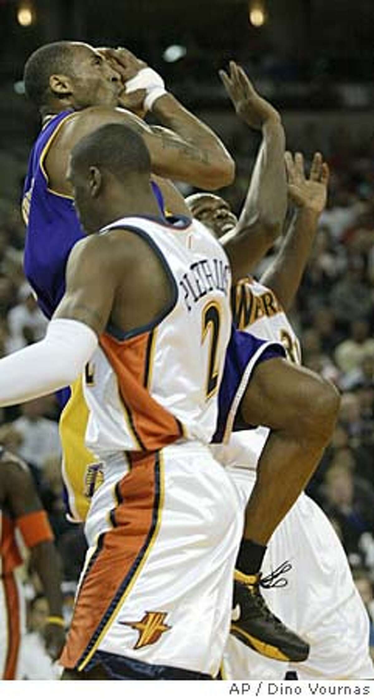 Bryant gets help beating the Warriors / Davis' tripledouble wasted as