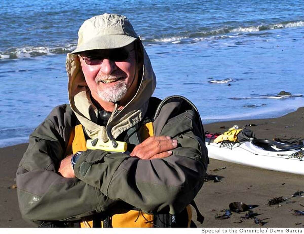 SLUG: 'swansong' CAP: 'Paul McHugh in his ocean paddling outfit, just before launch from the beach at Fort Ross. He's smiling because the end of his 40-day expedition from Oregon to San Francisco is starting to come into view." CREDIT: Dawn Garcia FOR: Outdoors, Sports, 8-31-2007