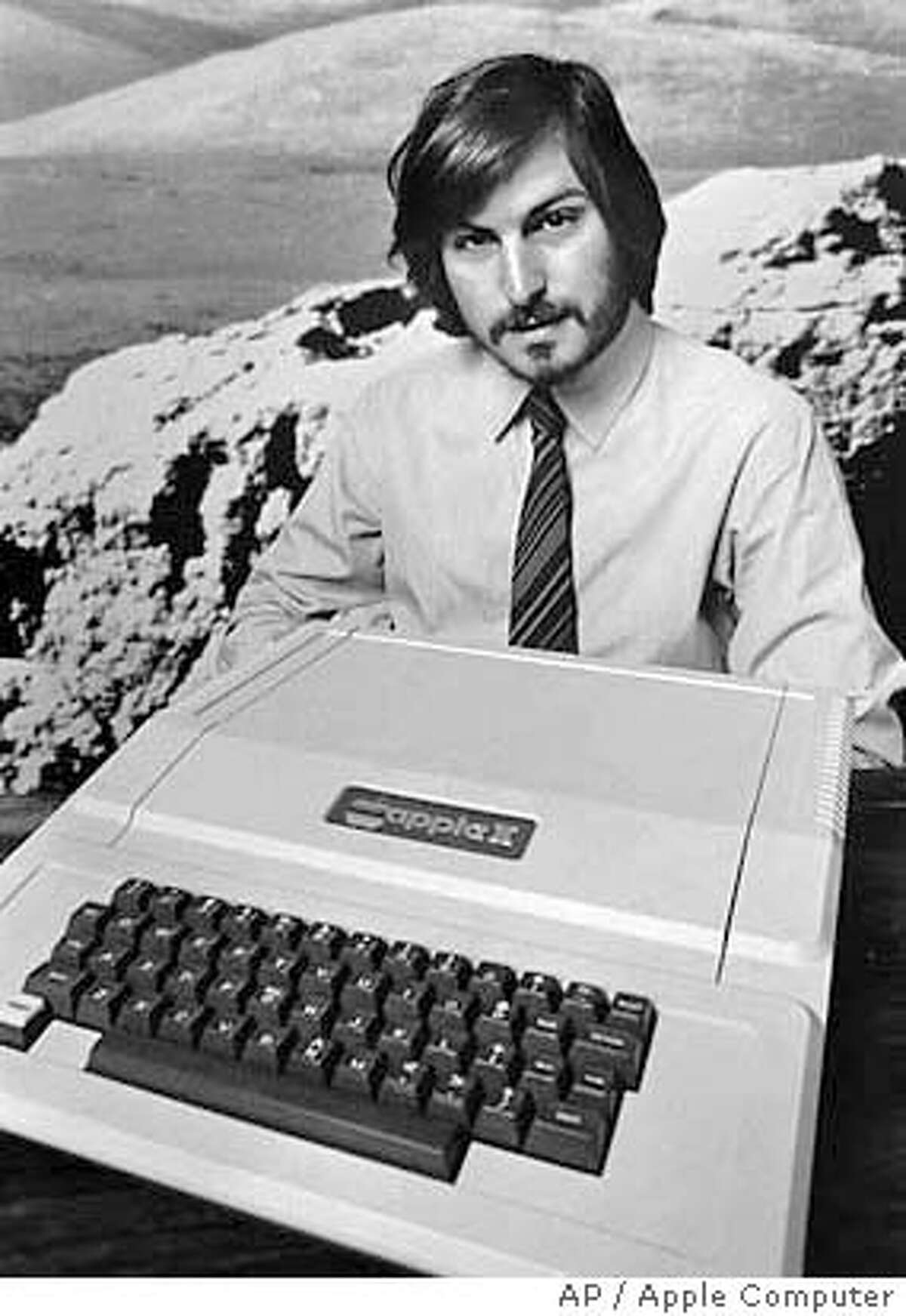 This is a 1977 photo of Apple Computer Inc. founder Steve Jobs as he introduces the new Apple II in Cupertino, Calif. Apple Computer was formed 20 years ago, on April Fool's Day in 1976. (AP Photo/Apple Computers Inc., file)