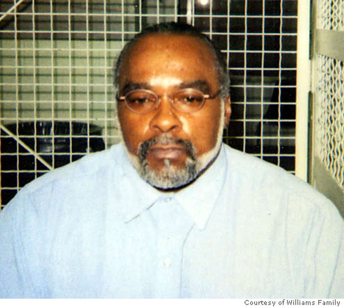 ** FILE ** In this undated photo provided by the family of Stanley Williams, Stanley "Tookie" Williams poses for a photo in the visiting area of San Quentin State Prison in California. Prosecutors asked the California Supreme Court on Sunday, Dec. 11, 2005 to reject former gang leader and convicted killer Williams' request to block his execution, set for early Tuesday. (AP Photo/Courtesy of Williams Family, File) Ran on: 12-12-2005 Ran on: 12-12-2005 Ran on: 12-13-2005 Ran on: 12-13-2005 Ran on: 12-13-2005 UNDATED HANDOUT