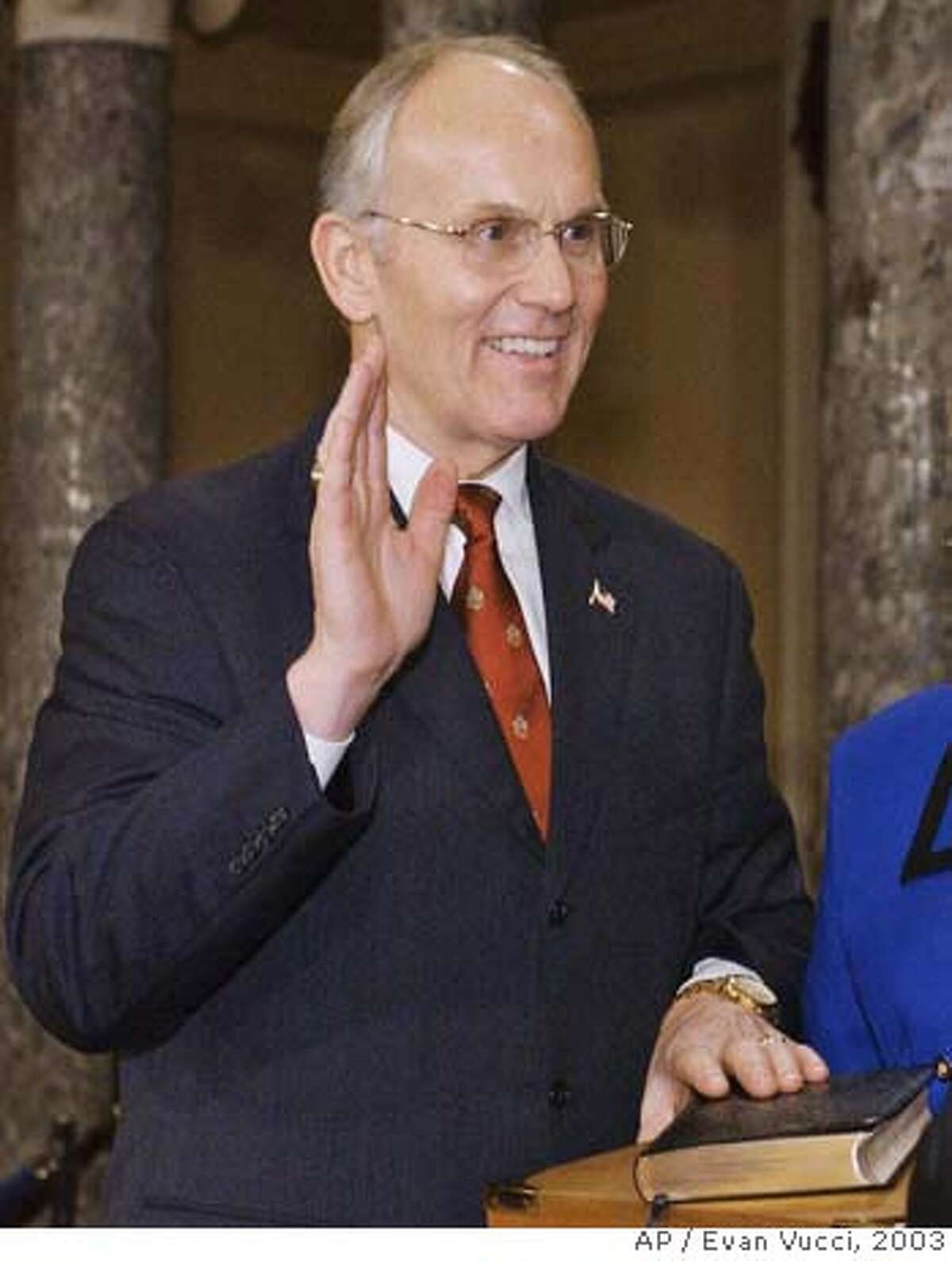 ** FILE **Sen. Larry Craig, R-Idaho, takes the oath of office during a mock swearing in ceremony in the Old Senate Chamber on Capitol Hill in Washington, in this Tuesday, Jan. 7, 2003, file photo. Craig of Idaho pleaded guilty in August 2007, to misdemeanor disorderly conduct after being arrested at the Minneapolis airport. Roll Call, a Capitol Hill newspaper, which first reported the case, said on its Web site Monday, Aug. 27, 2007, that Craig was arrested June 11 by a plainclothes officer investigating complaints of lewd conduct in a men's restroom at the airport. (AP Photos/Evan Vucci) JAN. 7, 2003, FILE PHOTO