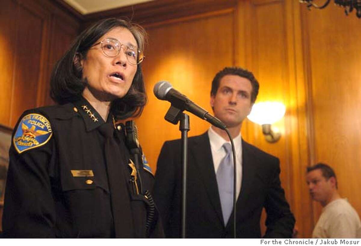 POLICEVIDEOS_02_JMM.JPG Chief of Police Heather Fong speaks with reporters during a press conference with Mayor Gavin Newsom to announce a series of videos made by San Francisco Police Officers of the Bay View Police Station. Twenty officers, including Captain Rick Bruce, were suspended due to the release of the videos to the public on a website. Event on 12/7/05 in San Francisco. JAKUB MOSUR / The Chronicle Ran on: 12-09-2005 Humorless?: Police Chief Heather Fong talks about the video. Ran on: 12-18-2005 Police Chief Heather Fong expressed outrage with the mayor, but scapegoating police in the Bayview seems to be misplacing blame. Ran on: 12-21-2005 Mayor Gavin Newsom started the community policing initiative, with the police chief, in August. Ran on: 12-21-2005 Mayor Gavin Newsom started the community policing initiative, with the police chief, in August. MANDATORY CREDIT FOR PHOTOG AND SF CHRONICLE/ -MAGS OUT