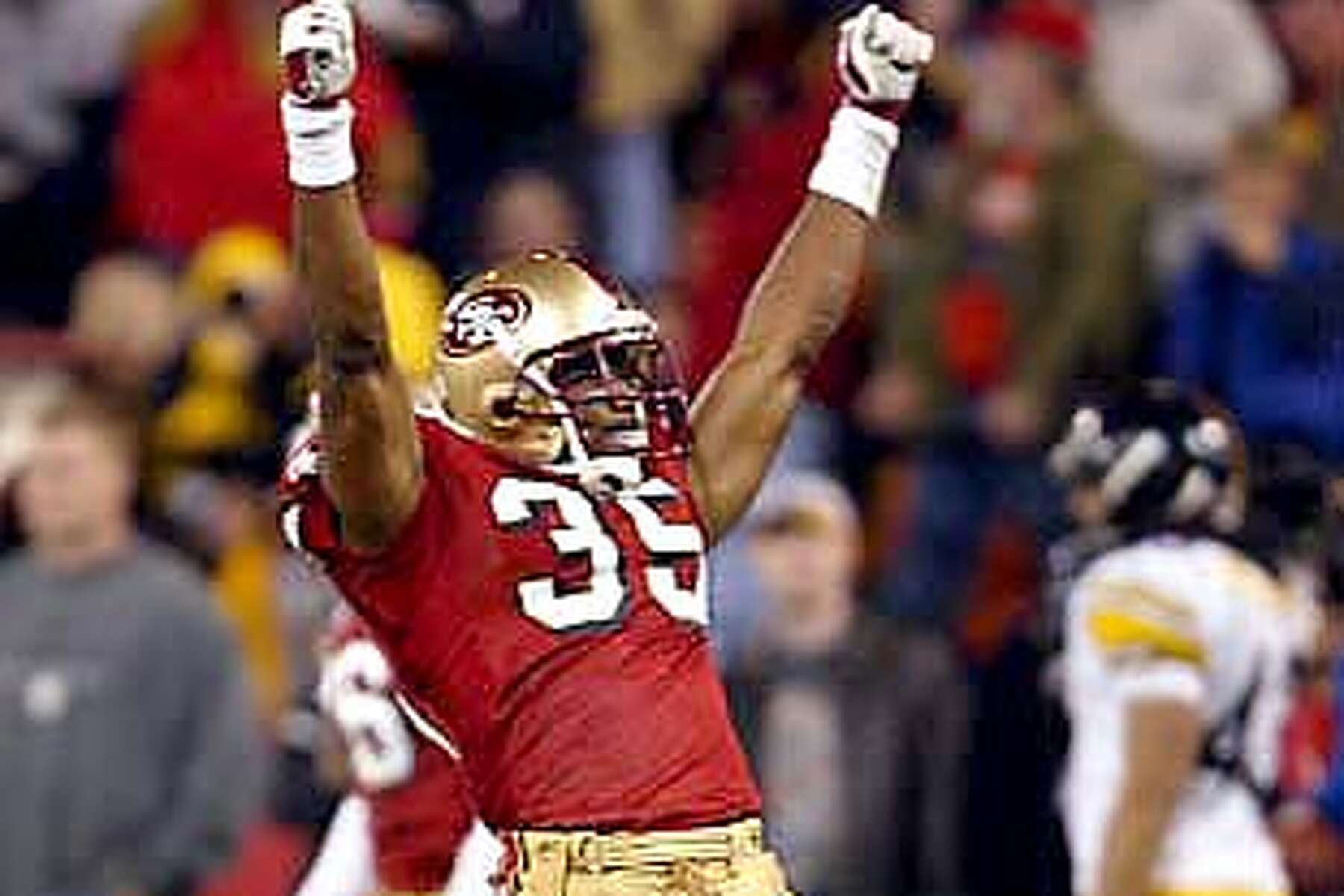 49ers #35 Dwaine Carpenter celebrates after the 49ers won their