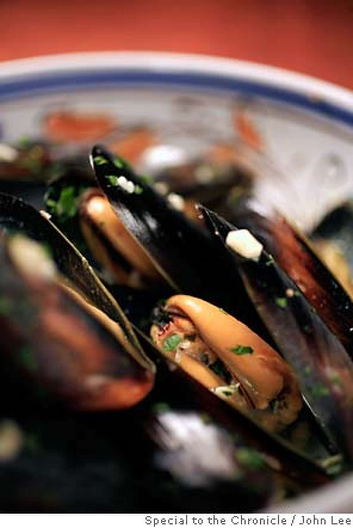 SEAFOOD29_MUSSELS_JOHNLEE.JPG Roasted Mussels. By JOHN LEE/SPECIAL TO THE CHRONICLE