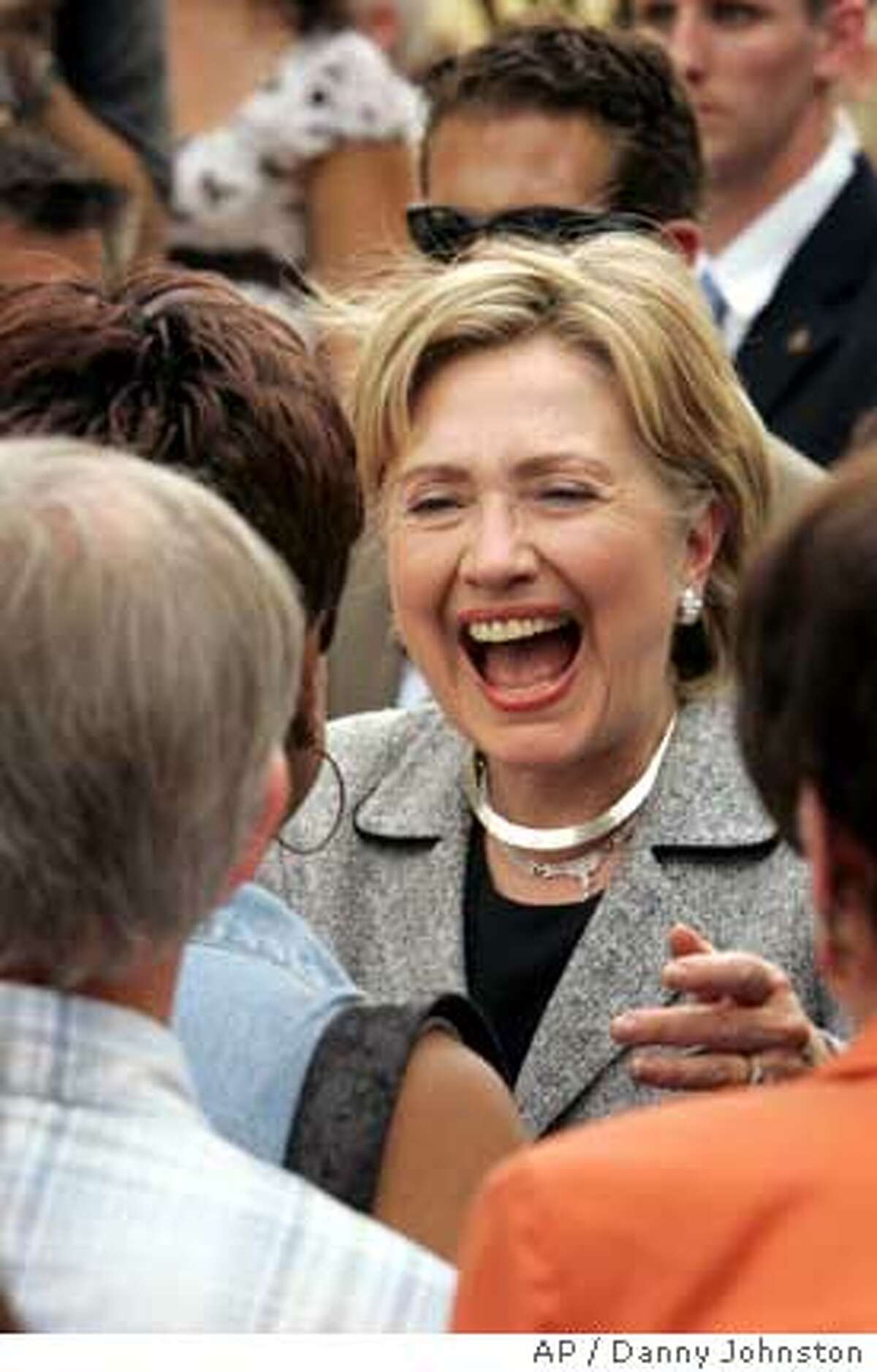 Democratic presidential hopeful U.S. Sen. Hillary Rodham Clinton, D-N.Y., greets supporters in Little Rock, Ark., Monday, Aug. 20, 2007, after Arkansas Gov. Mike Beebe endorsed her campaign. (AP Photo/Danny Johnston)