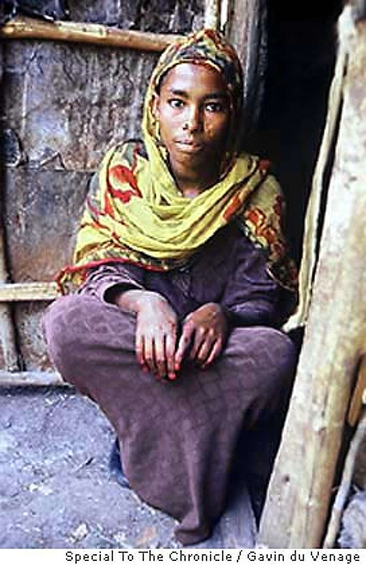 for ethiopia ; 22-year-old Zemu Tikulje a young woman from Abecha Village, 450 kilometres north of Addis Ababa, and the mother of four children. Young women like Tikulje can expect no� relief from childbirth year after year and abortion is often the only form of fertility control available to them. Gavin du Venage, / Special To The Chronicle / Gavin du Venage