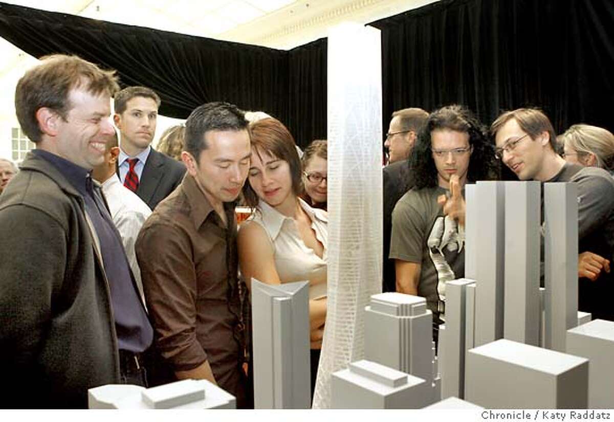 .jpg SHOWN: A very interested crowd examines the models--this model is from Skidmore, Owings & Merrill. The two people center are Paul Leveriza and Katrina Jagrova. Both are architects. The three finalist tower proposals in the Transbay Terminal competition are unveiled in the North Light Court of City Hall in San Francisco, CA. (Katy Raddatz/The Chronicle) **Skidmore, Owings & Merrill; Paul Leveriza; Katrina Jagrova Mandatory credit for the photographer and the San Francisco Chronicle. No sales; mags out.