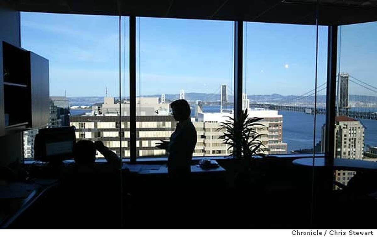 turnarounda0003_cs.jpg Event on 11/25/03 in San Francisco. Employees of GoldenGate Software (cq) enjoy a tremendous view of the SF Bay. The small software company recently moved from Sausalito to the top floors of a high-rise with views of the Bay Bridge at 301 Howard Street, SF. After three years of a near vertical rise in the commercial vacancy rate, companies are again starting to lease space in the city. Much of this is due to the sharp drop in rents, which experts say have finally bottomed out after the long dot-com fallout. Chris Stewart / The Chronicle MANDATORY CREDIT FOR PHOTOG AND SF CHRONICLE/ -MAGS OUT