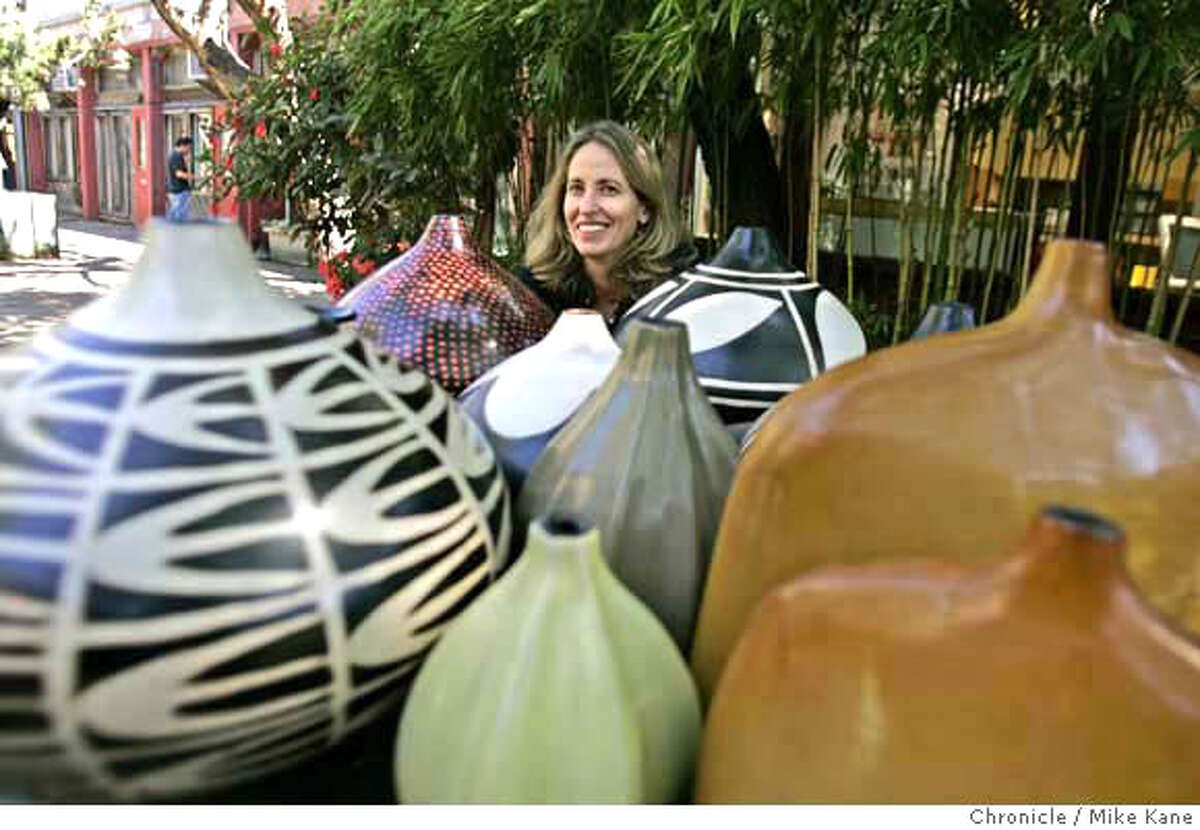 .jpg Mimi Robinson, a San Francisco artist/designer, poses with native art from Mexico and South America that she has helped to develop and market, at her studio in San Francisco, CA, on Friday, July, day}, 2007. photo taken: 7/27/07 Mike Kane / The Chronicle **Mimi Robinson MANDATORY CREDIT FOR PHOTOG AND SF CHRONICLE/NO SALES-MAGS OUT