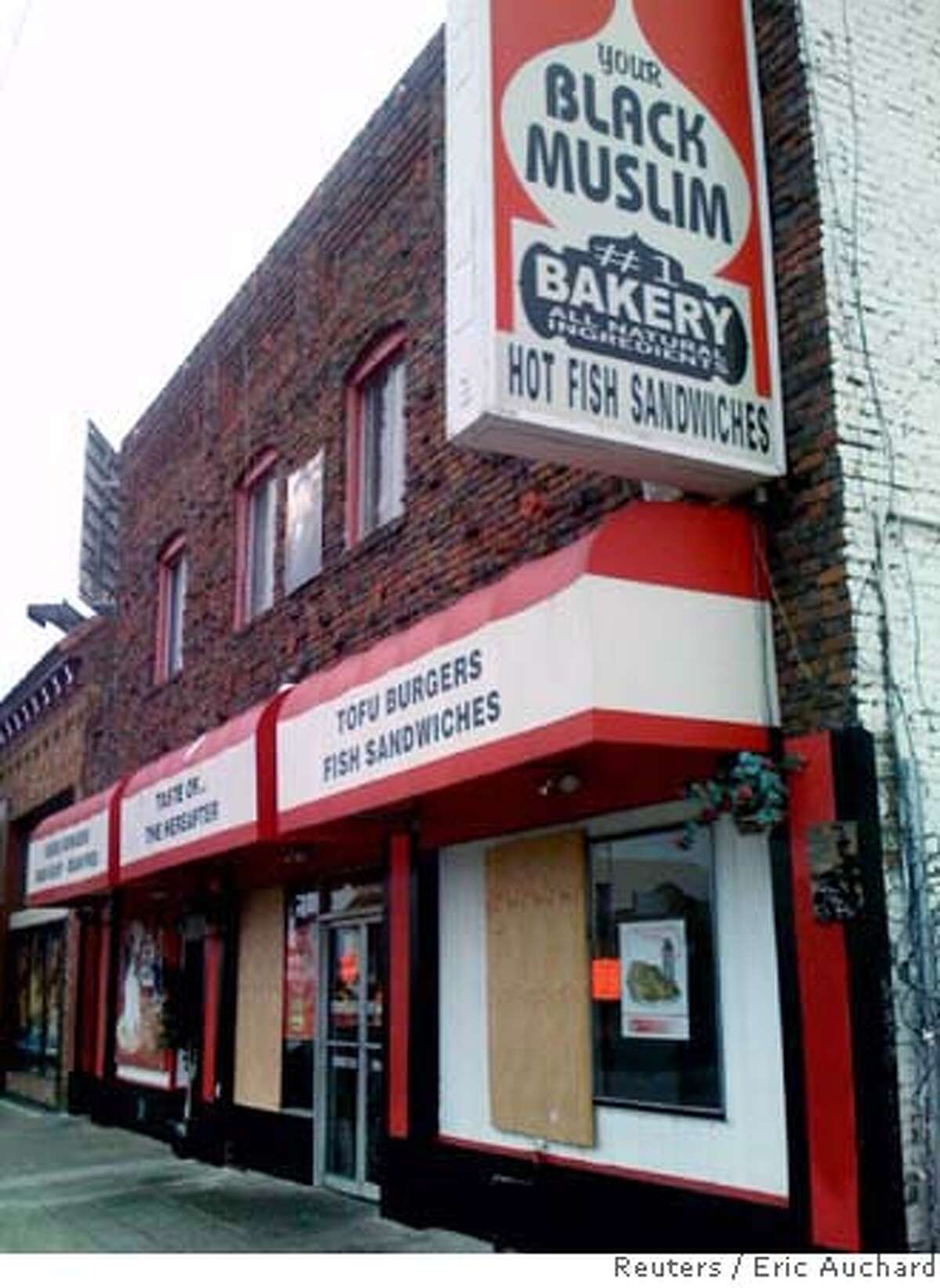 Your Black Muslim Bakery is seen in North Oakland, California, in this August 5, 2007 picture. The bakery was the cornerstone establishment of a local self-help group that has been implicated by Oakland police in the murder of local journalist Chauncey Bailey, the editor-in-chief of the Oakland Post. The bakery was one of several establishments owned by the group which was raided by 200 police on August 3, who detained seven suspects, including one who later confessed to murdering Bailey. REUTERS/Eric Auchard (UNITED STATES)