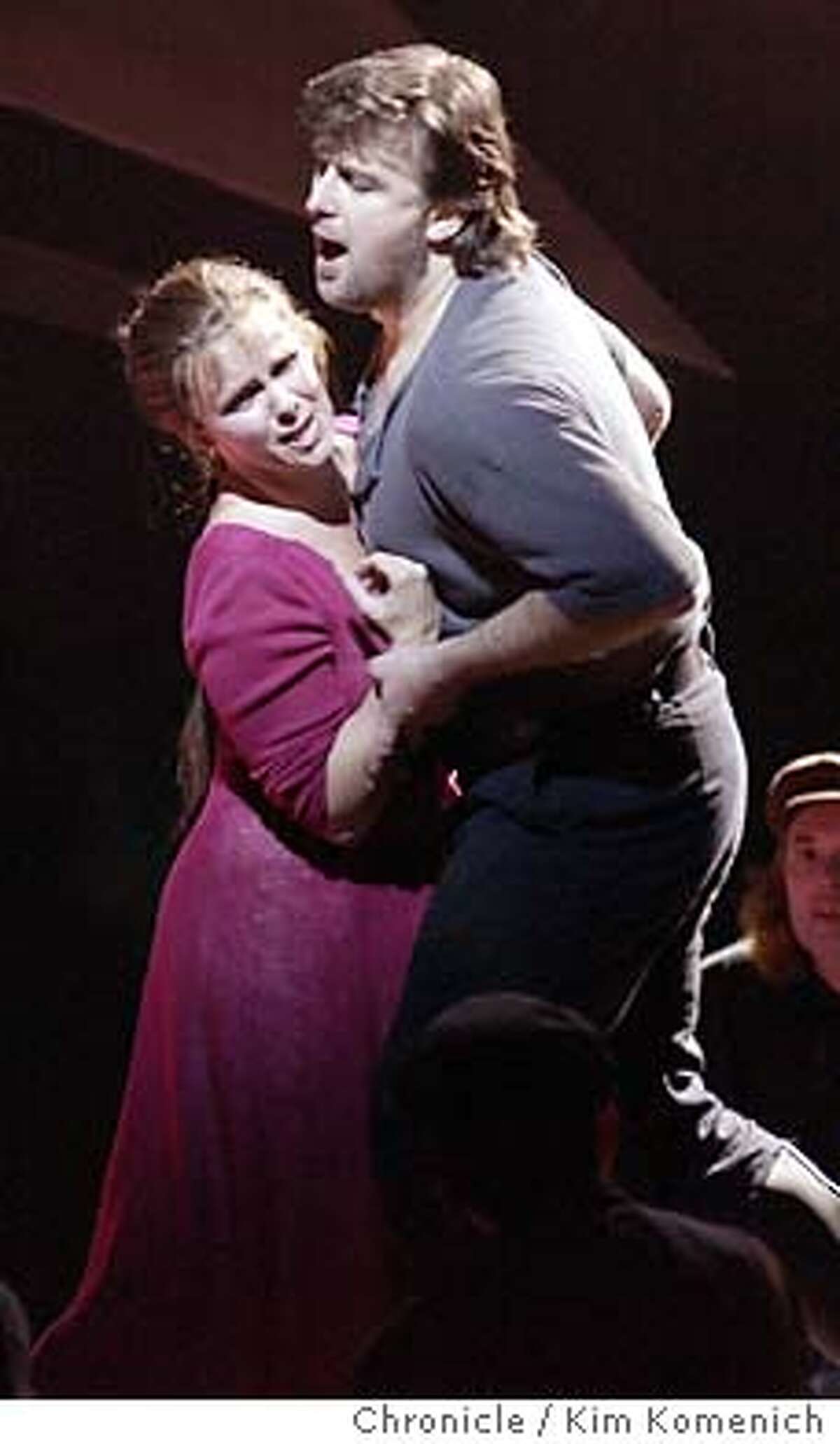 11/6/03 in San Francisco. San Francisco Opera presents Lady Macbeth of Mtsensk. Katerina (Solveig Kringelborn) accepts a challenge from Sergei (Christopher Ventris) to prove her strength. KIM KOMENICH / The Chronicle