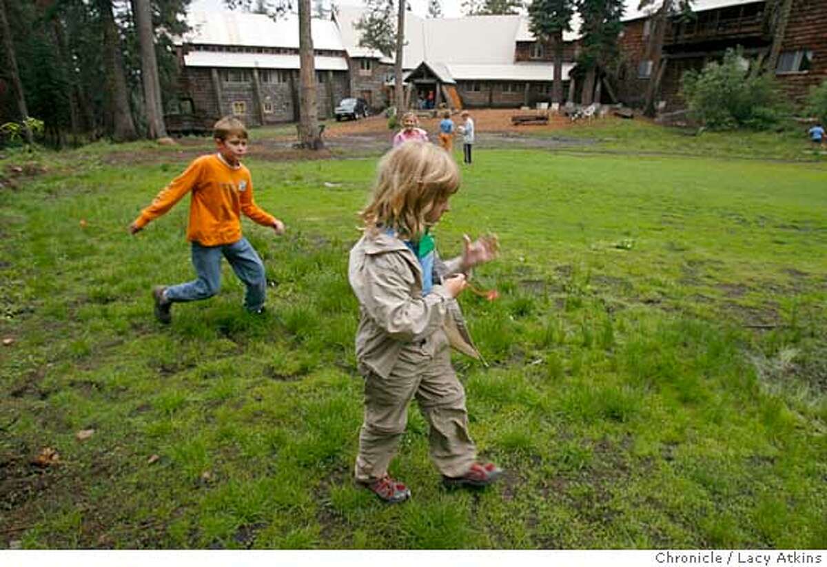 (left to right) Ben Cobb and Sophie Comer run the grounds of the Clair Tappaan Lodge as they play Wednesday June 28, 2006, in Nordan, Ca. The Sierra Club has owned an operated a large, rambling, rustic lodge in Sierra for 70 years. Clair Tapaan Lodge has been used for conferences, for family get-togethers, and to launch several generations of skiers and hikers. Now there is consternation that the lodge may be sold, since the Club must subsidize it to the tune of $100k per year - money that would be better spent on the Club's important legal and lobbying activities, June 28, 2006, in San Francisco, Ca. (Lacy Atkins/The Chronicle) Ran on: 07-06-2006 A group staying at Clair Tappaan Lodge goes hiking. The lodges owner, the Sierra Club, says it must become profitable and more relevant or be closed or sold. Ran on: 08-02-2007 A group of hikers, above, hits the trail and heads out from the rustic Clair Tappaan Lodge, the Sierra retreat owned by the Sierra Club for 70 years. Ben Cobb and Sophie Comer, left, play on the grounds of the lodge, which is near Donner Pass.