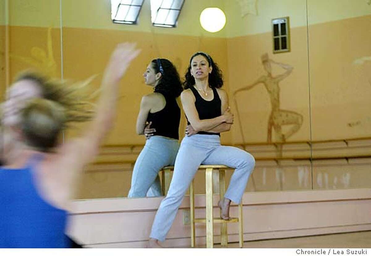 Yasmen Sorab Mehta watches Will Elder-Groebe and Jamie Duggan rehearse "Day and Dreams". Mehta choreographs and fine tunes a piece titled "Day and Dreams" for the production "It's a Sign" on 10/19/03 in San Francisco, CA. Photo by Lea Suzuki/ The San Francisco Chronicle.