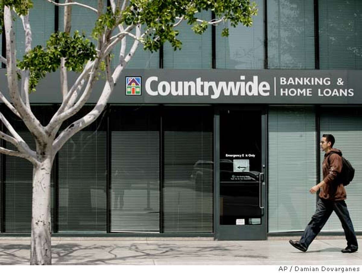 � **FILE** The Countrywide Banking and Home Loans office in Glendale, Calif. is seen in this April 26, 2007 file photo. Countrywide Financial Corp.'s profit shrank by nearly a third in the second quarter as a slumping housing market put pressure on the mortgage lender's customers, the company said Tuesday, July 24, 2007. (AP Photo/Damian Dovarganes, file) APRIL 26, 2007 FILE PHOTO