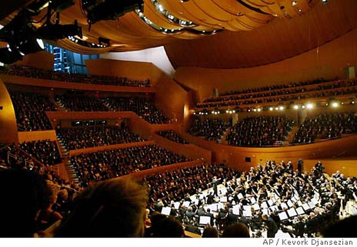 Los Angeles Philharmonic Music Director Esa-Pekka Salonen leads the orchestra during a grand opening concert gala at the new Walt Disney Concert Hall in Los Angeles, Thursday, Oct. 23, 2003. (AP Photo/Kevork Djansezian)