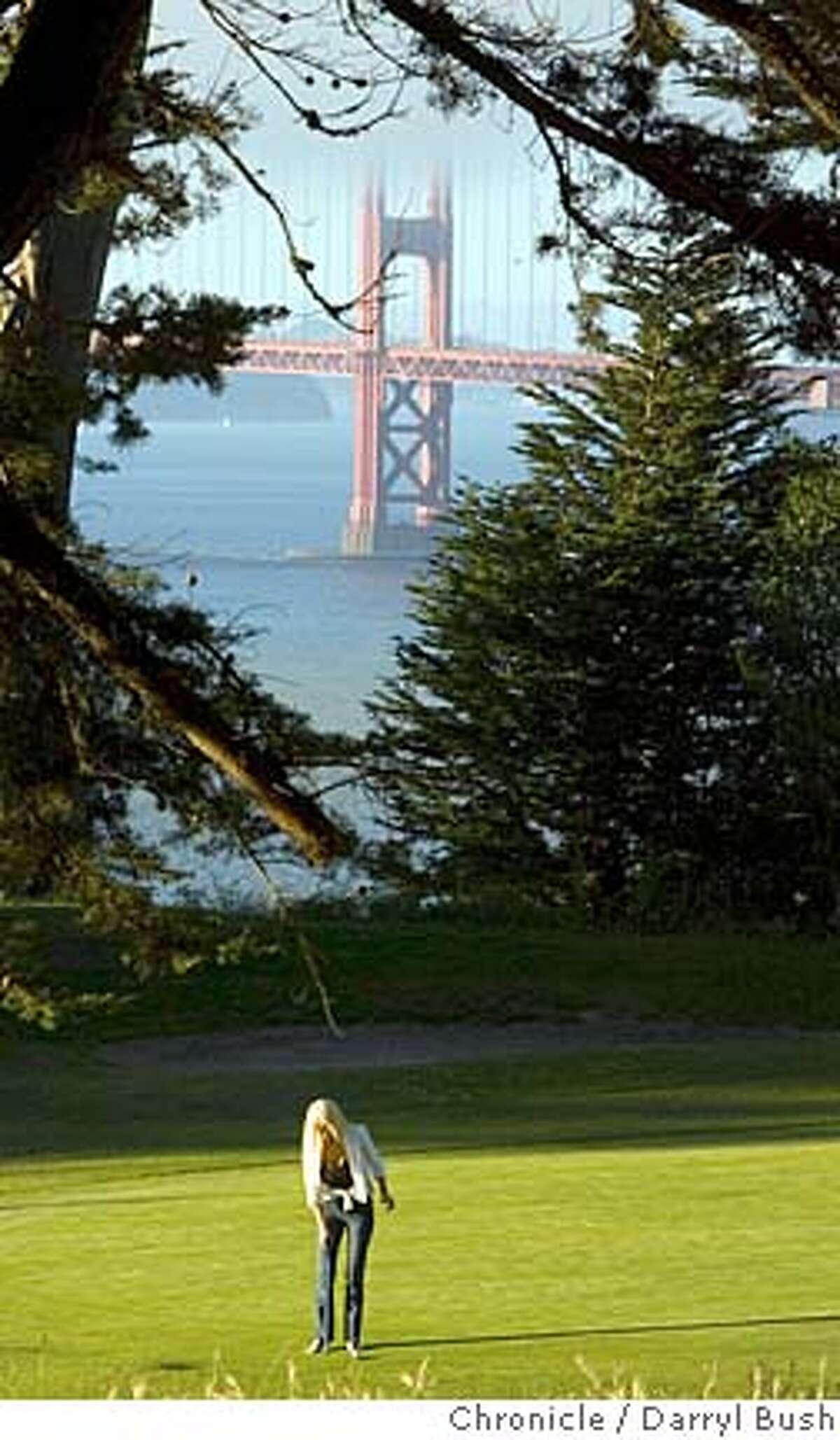feature_0002_db.JPG Karen Stratford of San Francisco, lines up a putt on the 17th green of Lincoln Park Golf Course with the Golden Gate Bridge in the background in San Francisco, CA, on Thursday, June, 28, 2007. photo taken: 6/28/07 Darryl Bush / The Chronicle ** (cq) Ran on: 06-29-2007 Karen Stratford of San Francisco lines up a putt on the scenic 17th green of Lincoln Park Golf Course. MANDATORY CREDIT FOR PHOTOG AND SF CHRONICLE/NO SALES-MAGS OUT