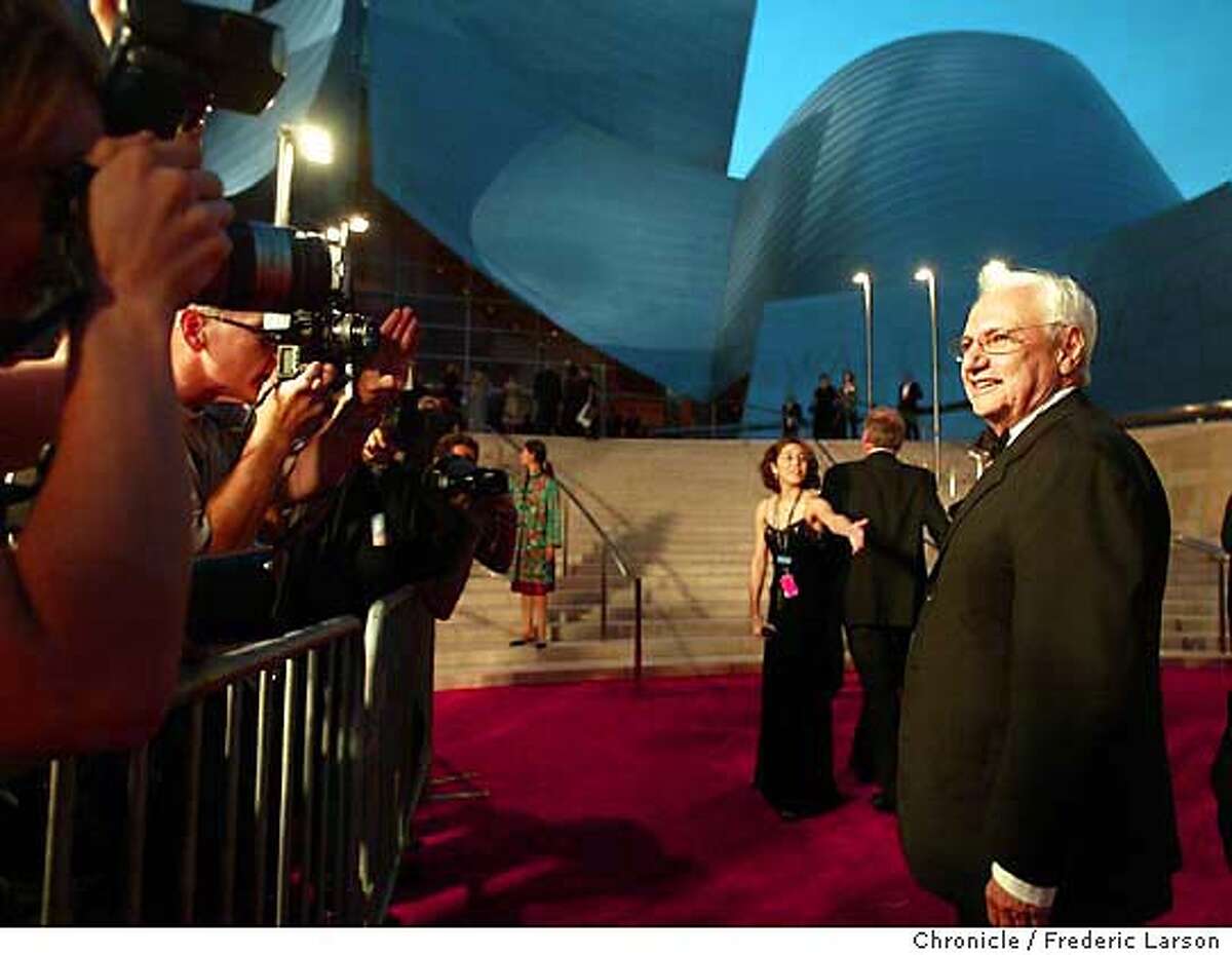 ; Frank Gehry the architect of the new Walt Disney Concert Hall in Los Angeles stop for photographers in from of his crown jewel in downtown LA. Los Angeles Philharmonic brought many Hollywood celebrity who walked carpet before the first performance. FREDERIC LARSON / The Chronicle