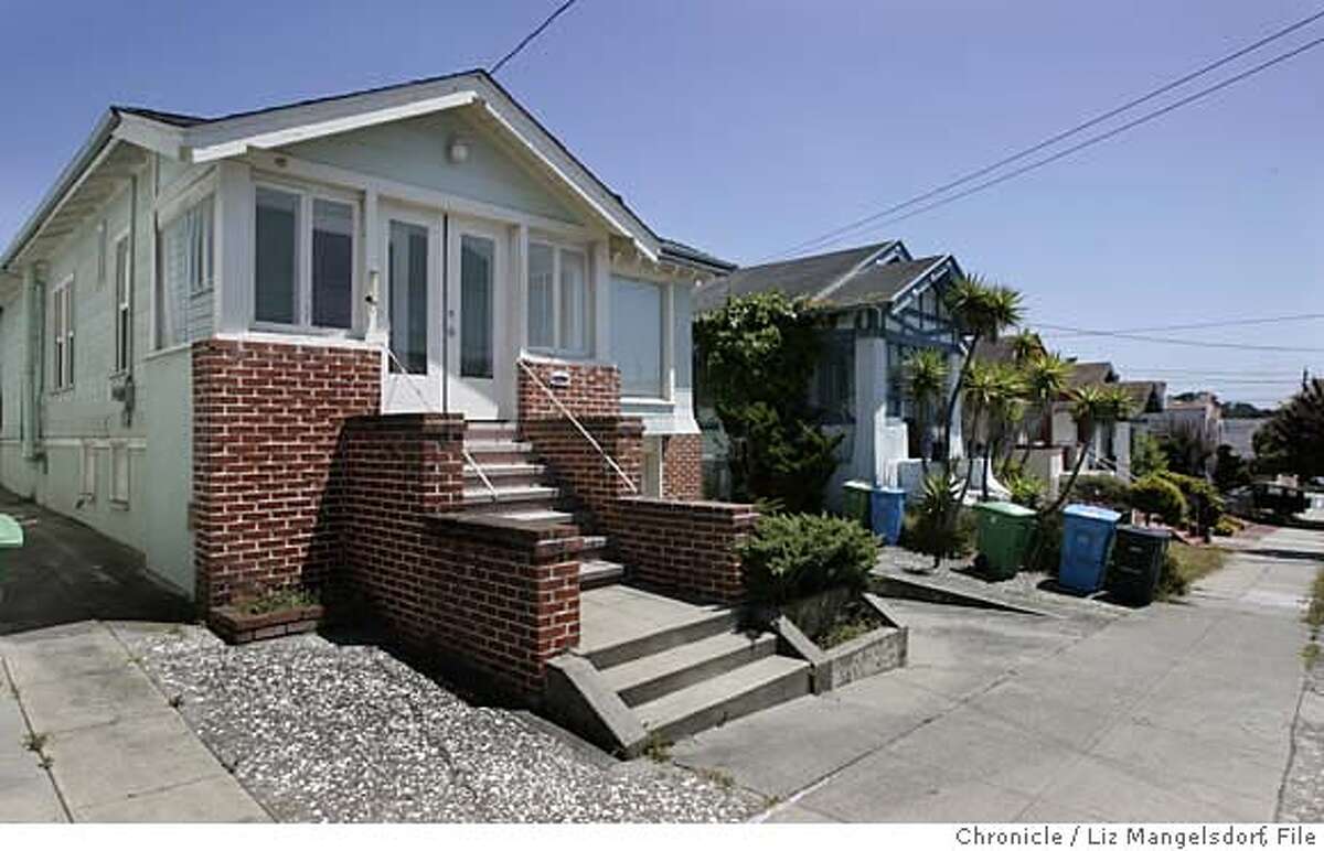 The property (left) at 2450 28th Ave, in San Francisco (allegedly empty). Owned by Ed Jew and listed as his residence so he can represent his district on the board of supervisors. (Information supplied by reporter) Photographed on May 21, 2007 Liz Mangelsdorf/the Chronicle Ran on: 05-22-2007 Ed Jews filing said he resided where the city determined water hadnt been turned on. Ran on: 05-22-2007 Ed Jews filing said he resided where the city determined water hadnt been turned on. Ran on: 07-14-2007 BURLINGAME: Ed Jew signed loan papers in September listing his address as this home on Roosevelt Avenue, the city attorney says.