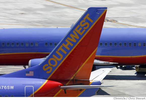 Wanna get away? Bring more money / As Southwest Airlines passengers get