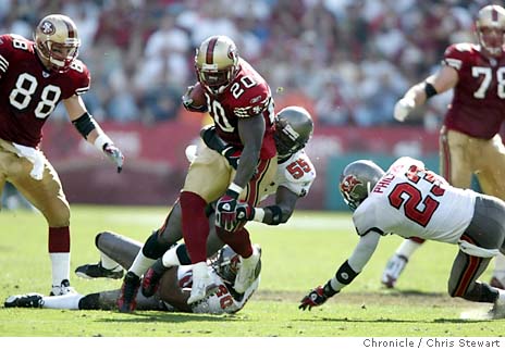 San Francisco 49ers Jamie Winborn, #55, walks onto the field