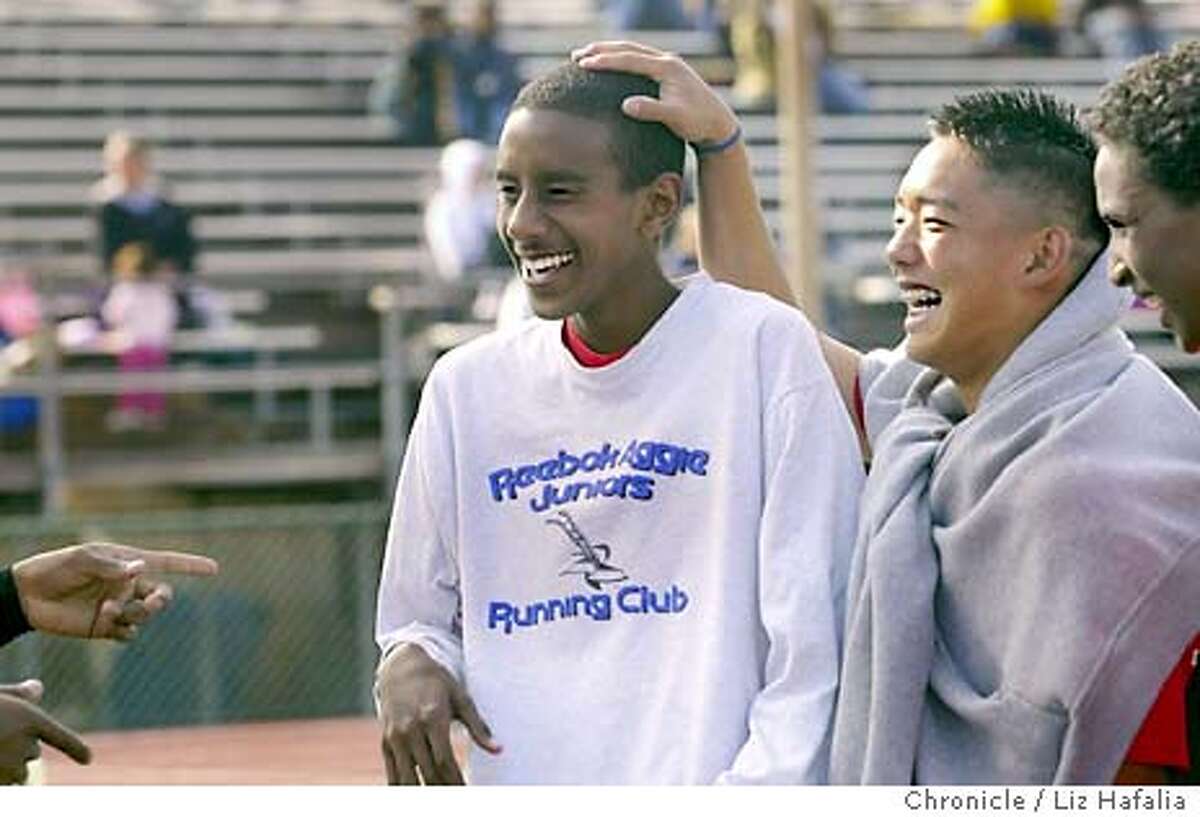 Feature on members of the James Logan High School track team. Yosef Ghebray with his teammates after the race. Shot on 5/16/03 in Union City. LIZ HAFALIA / The Chronicle