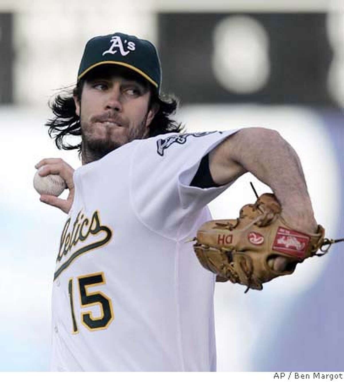 Oakland Athletics' Dan Haren works against the Seattle Mariners in the first inning of a baseball game Friday, July 6, 2007, in Oakland, Calif. (AP Photo/Ben Margot)