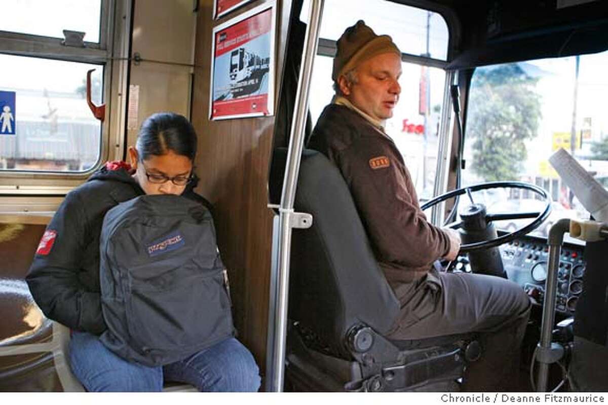 � andrea_011_df.jpg Andrea takes the seat closet to the bus driver on the 14 Mission as she rides to school. Andrea Macias, 11, lives in a studio apartment in the Tenderloin with her mother, her grandmother, her sister and her neice, four generations of women. She will be entering middle school next year and is at the crossroads from childhood to womanhood. Photographed in San Francisco on 3/27/07. Deanne Fitzmaurice / The Chronicle Mandatory credit for photographer and San Francisco Chronicle. No Sales/Magazines out.