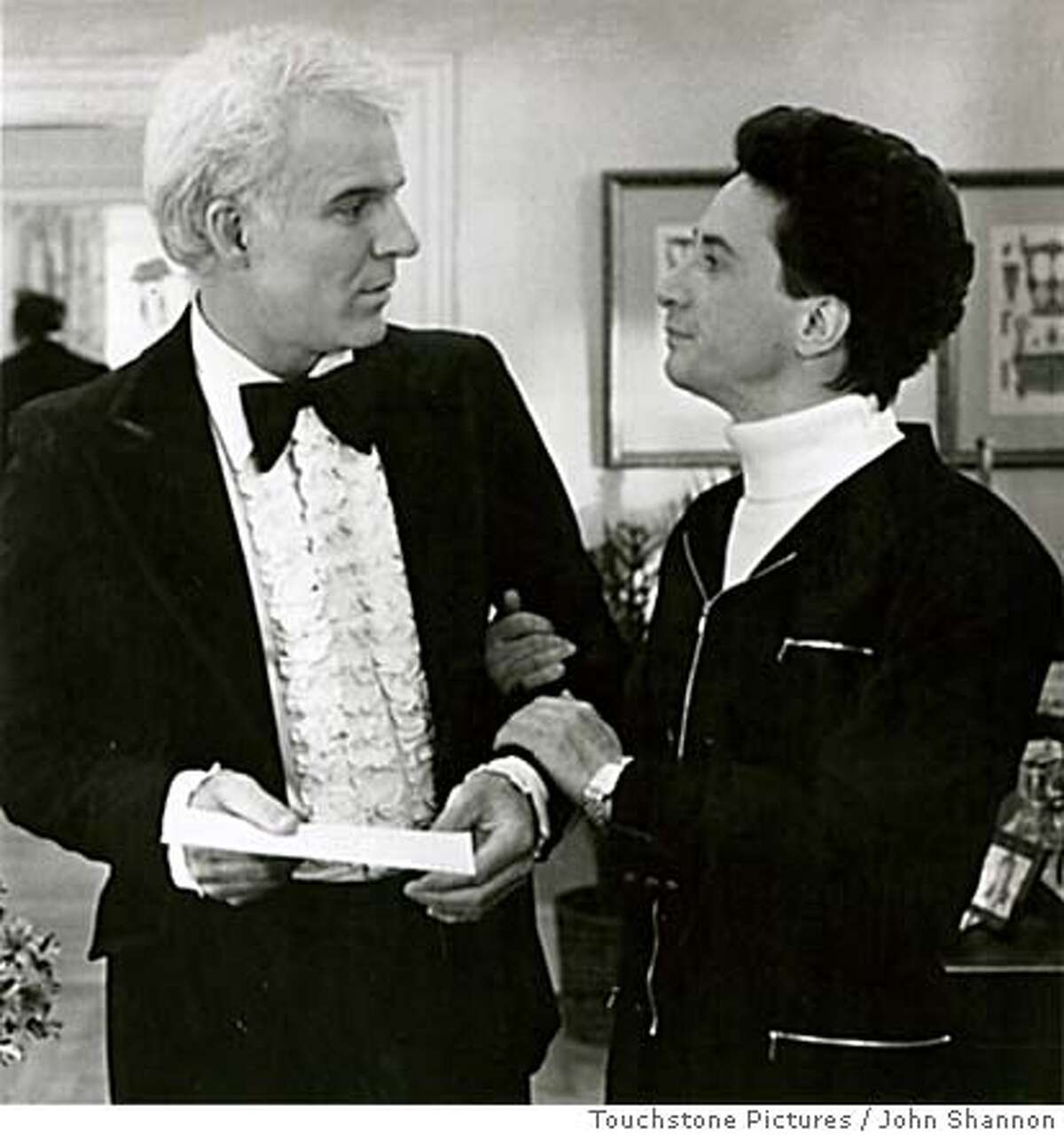 Steve Martin (left) plays George and Martin Short plays Franck the flamboyant and officious wedding planner in "Father of the Bride."