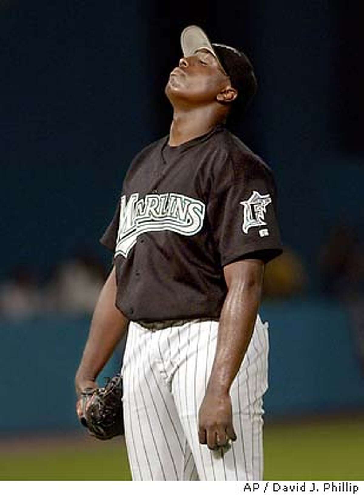 / Ramirez rips a pair of homers, Marlins on brink of elimination