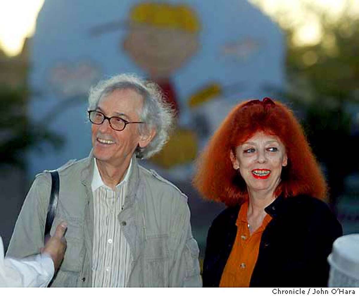 Charles Shulz Museum 2301 Hardies Lane, Santa Rosa,CA. Christo and Jeanne-Claude, outside in the garden talking with visitors. Christo and Jeanne-Claude (Christo's wife) present "wrapped Snoopy House" at the Charles Schult Museum Photo/John O'Hara