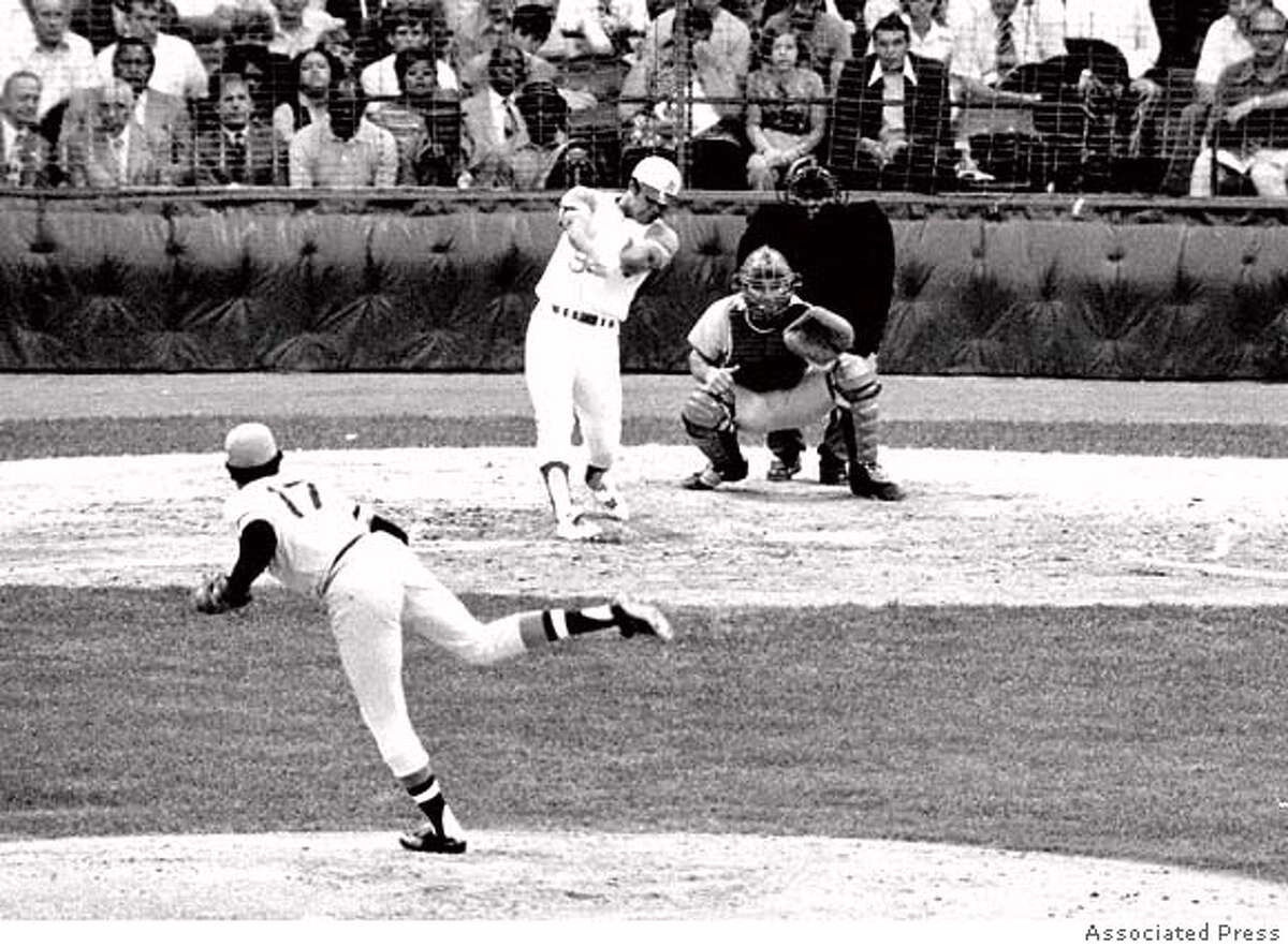 The American League's Reggie Jackson follows through on a towering third inning home run with a man on base in All-Star game in Detroit on July 13, 1971. National League pitcher is Dock Ellis of the Pittsburgh Pirates and catcher is Johnny Bench. Jackson's jolt started an American league comeback after Bench's second inning homer got the National League on the scoreboard. The Amercan League won the game 6-4, with two run homers by Jackson, Frank Robinson, and Harmon Killebrew. (AP Photo)