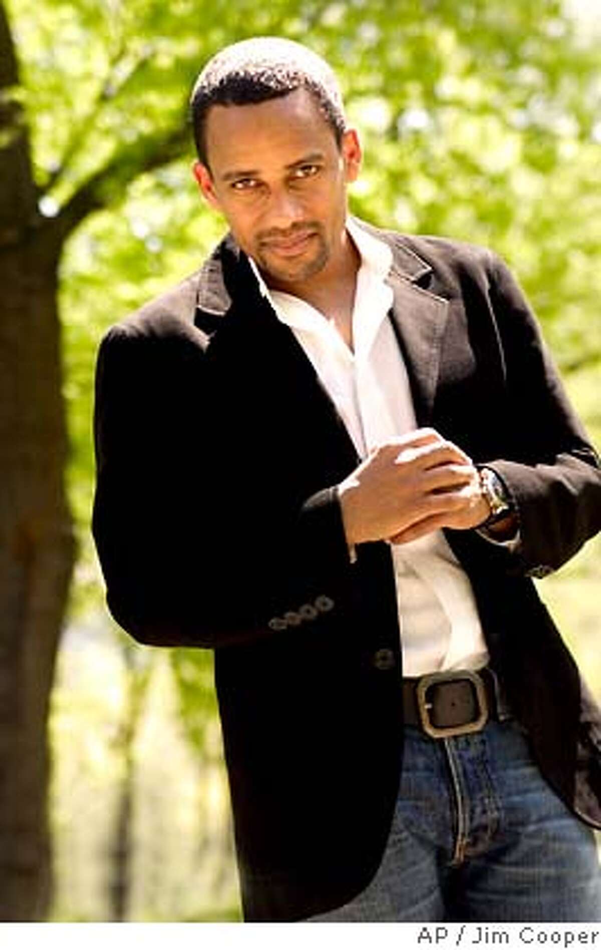 ** ADVANCE FOR WEEKEND EDITIONS, MAY 11-14 **Actor Hill Harper poses in New York's Central Park on April 27, 2006. Harper, who portrays Dr. Sheldon Hawkes on the CBS drama "CSI: NY," just published his first book, "Letters to a Young Brother: MANifest Your Destiny." (AP Photo/Jim Cooper) ADVANCE FOR WEEKEND EDITIONS, MAY 11-14