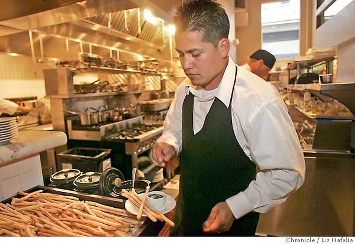 BREADSTICKS_PERBACCO_LH_157.JPG Jose Murillo serving breadsticks at Perbacco. Photographed by Liz Hafalia/The Chronicle/San Francisco/6/13/07 **Jose Murillo cq MANDATORY CREDIT FOR PHOTOGRAPHER AND SAN FRANCISCO CHRONICLE/NO SALES-MAGS OUT