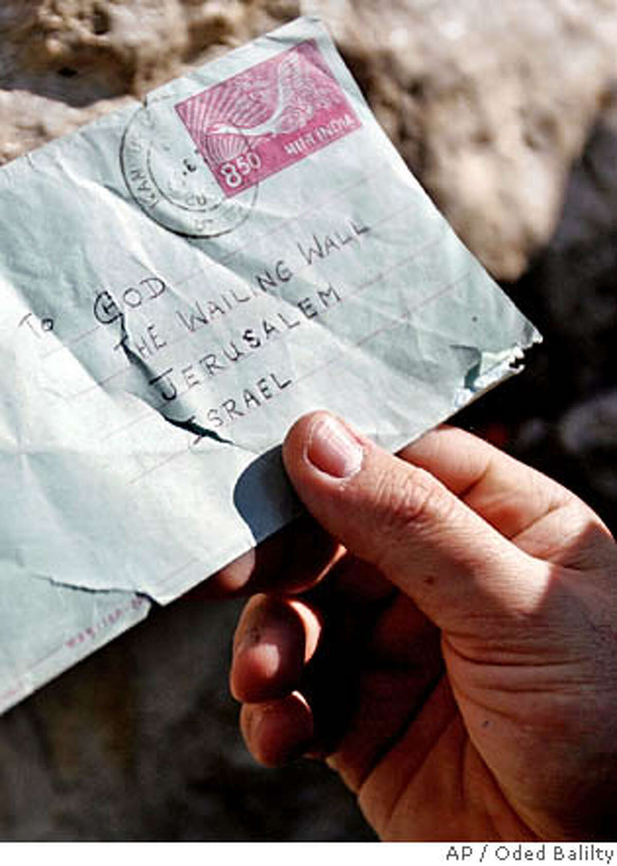 Where letters to God go / Gestures of hope reflect Holy Land's fervent ...