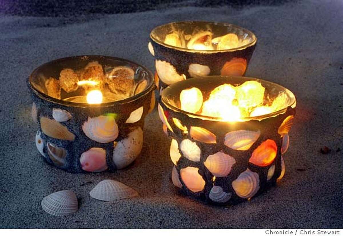Votive candles covered with sea shells and liquid leading. Story is about craft projects that can be done at the beach. Meet artist and writer Steven James at Baker Beach to photograph a sand-casting project. Get step-by-step process of making free-form plaster of Paris sand casts. Also get shots of the other two finished projects he will bring along. Can get James in one of the shots. CHRIS STEWART / The Chronicle