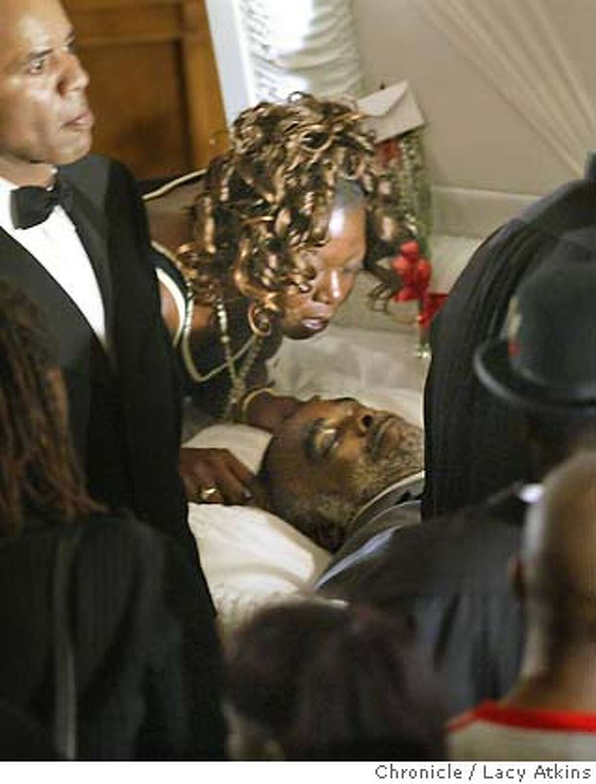 D'Metri Holiwell , sister of Stanley Tookie Williams leans over his body at his funeral in Los Angeles, Dec. 20, 2005. Funeral for Stanley Tookie Williams at the Bethel Church in Los Angeles, Dec. 20, 2005 Photo By Lacy Atkins