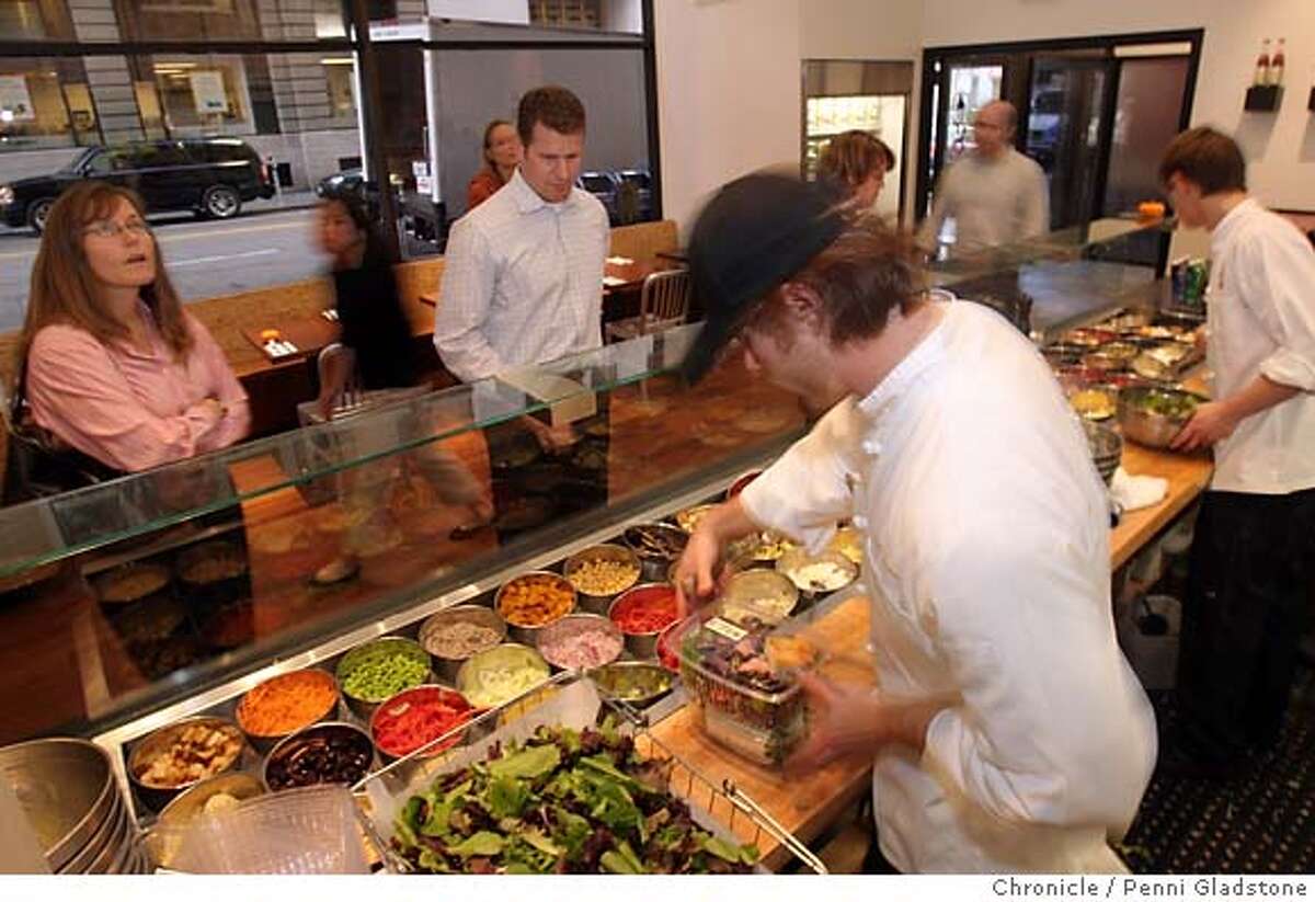 SPECIAL19 Just before the lunch rush, Matt Brown serves customers at the salad bar at Mixt Greens. This is an eco-friendly organic restaurant that's very popular with the Financial District crowd Event on 11/8/06 in San Francisco. Penni Gladstone / The Chronicle Ran on: 11-19-2006 Matt Brown serves customers at Mixt Greens just before the lunch rush at the Financial District gourmet salad restaurant. Ran on: 06-13-2007 Organic to order: Salad cook Matt Brown assembles an order at Mixt Greens, which just opened a second downtown location.