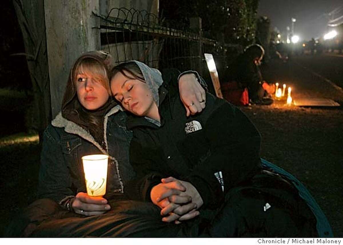 Amanda Barovro of Argentina and Sylvia Calierno of Berkeley comfort each other after Williams was executed. The vigil outside the gates to San Quentin Prison where Stanley "Tookie" Williams was executed shortly after midnight, Tuesday morning December 13, 2005. Pro and anti death penalty advocates were on hand to voice and demonstrate their views. Williams, once the leader of the Crypts gang was convicted and sentenced to death for 4 murders. The governor refused clemency for Williams Monday. Event in San Quentin, CA Photo by Michael Maloney / The Chronicle