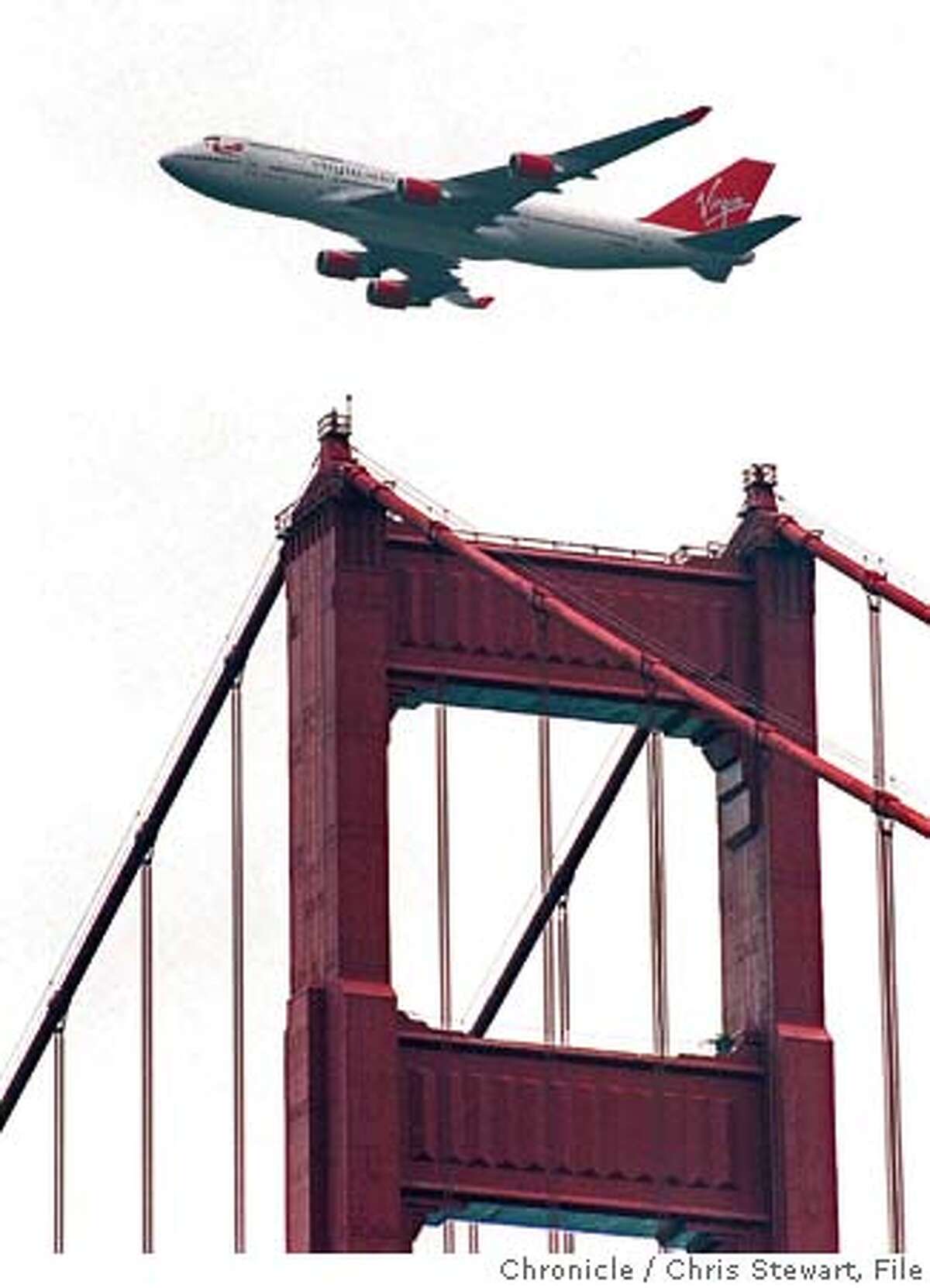 VIRGIN ATLANTIC AIRWAYS BOEING 747-400 FLIES OVER GOLDEN GATE BRIDGE ALSO RAN: 9/2/99 Gov. Arnold Schwarzenegger, right, is lobbying Virgin Atlantics Richard Branson. Also ran 01/17/04 CAT