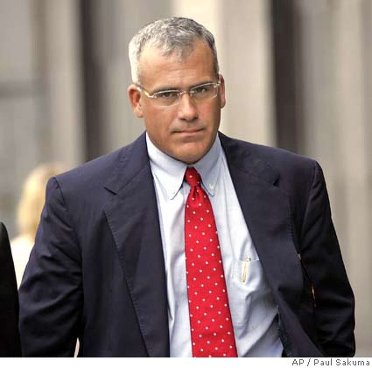 ** OMITS REFERENCE TO STEPHANIE JENSEN, WHO HAS NOT BEEN CRIMINALLY CHARGED ** Brocade's former CEO Gregory L. Reyes walks into a federal courthouse in San Francisco, Wednesday, Aug. 2, 2006. Reyes became the first chief executive to be criminally charged over alleged improper accounting of stock options. (AP Photo/Paul Sakuma) Ran on: 08-03-2006 Brocades former CEO Gregory Reyes walks into a federal courthouse in San Francisco to face securities fraud charges. OMITS REFERENCE TO STEPHANIE JENSEN, WHO HAS NOT BEEN CRIMINALLY CHARGED. STAND ALONE PHOTO