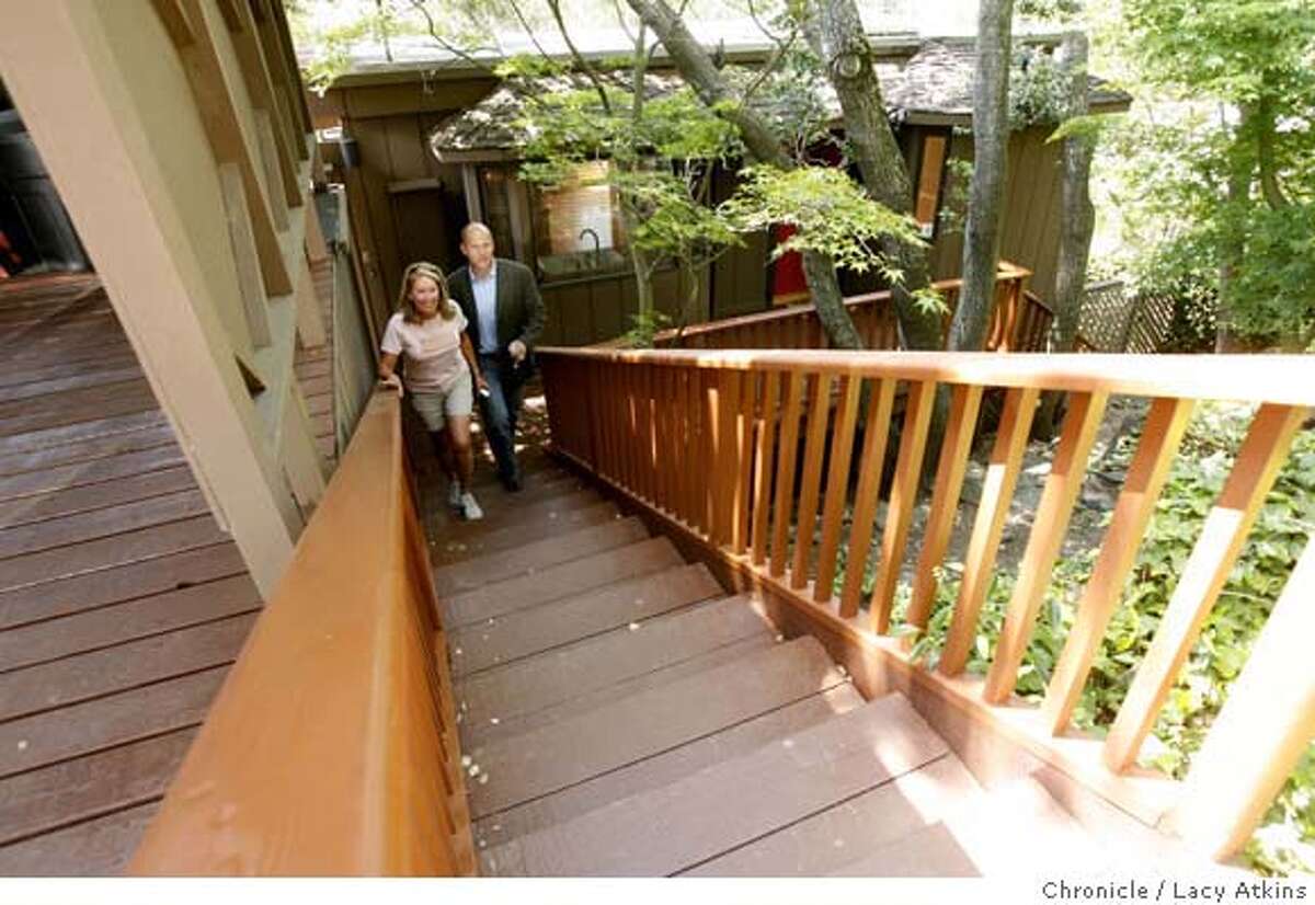 Realtor Payton Stiewe shows a median marked home in Mill Valley to developer Cheryl Cason, May 16, 2007, in Mill Valley, CA. Numbers show that Marin Counties median home price is $1,010.00 the first time any California county has surpassed the $1 million mark.(Lacy Atkins /San Francisco Chronicle) MANDATORY CREDITFOR PHOTGRAPHER AND SAN FRANCISCO CHRONICLE/NO SALES-MAGS OUT