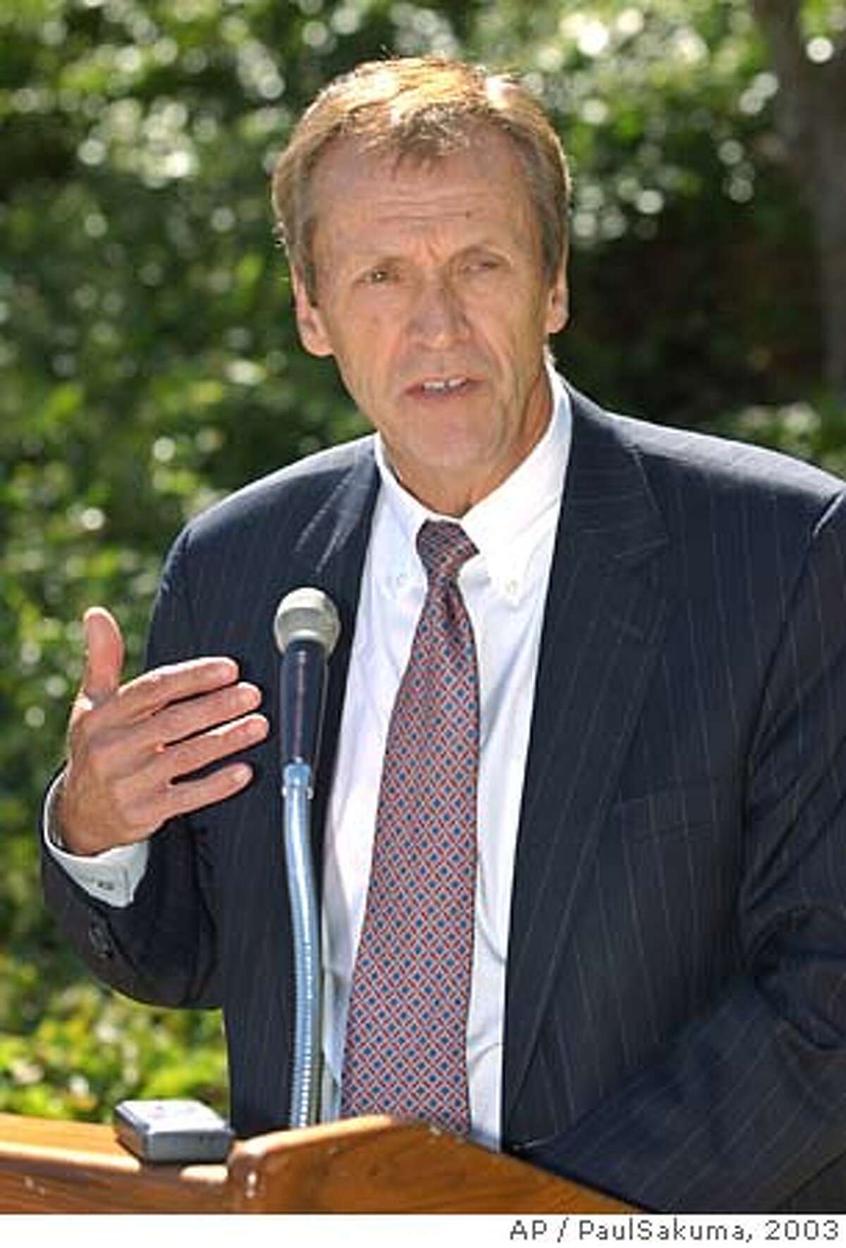 Robert C. Dynes, chancellor of the University of California, San Diego, gestures during a news conference in opposition to Proposition 54 during a break in the UC Board of Regents meeting in San Francisco, Wednesday, Sept. 17, 2003. Proposition 54 prohibits state and local governments from classifying any person by race, ethnicity, color or national origin in public education, contracting or employment. Dynes will replace UC President Richard C. Atkinson, who is retiring later this year. (AP Photo/PaulSakuma)