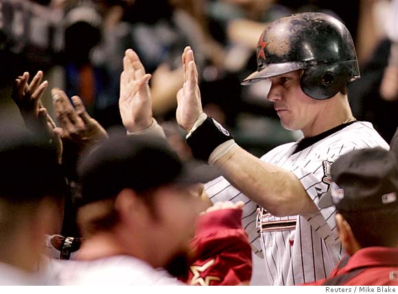 Chicago White Sox's Geoff Blum kisses the World Series trophy as the White  Sox celebrate their 1-0 win over the Houston Astros in game 4 of the World  Series, October 26, 2005